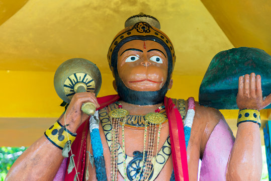 The monkey god Hanuman carrying a piece of the Himalaya mountain in its hand. One small part he lost in Unawatuna. It is the Rumassala hill with its medical herb in the south of Sri Lanka