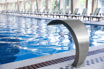 Indoor swimming pool in modern hotel