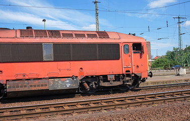 Fototapeta na wymiar Red diesel engine at the station