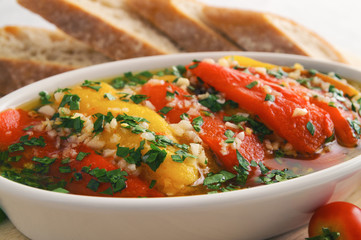 roasted and peeled bell peppers marinated in olive oil, lemon juice, parsley, and garlic