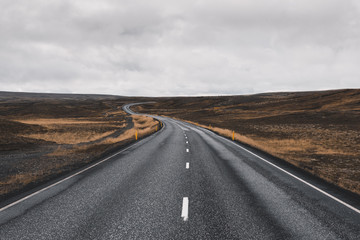 Fototapeta premium Curvy road and autumn landscape in Iceland