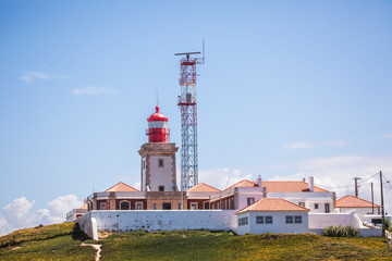 Fototapeta na wymiar Nice view of a lighthouse with the ocean in Portugal