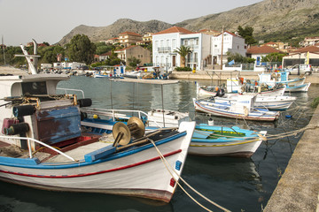 Fototapeta na wymiar Plagia, Greece- May 12, 2017 : Fishing port in Plagia, Greece
