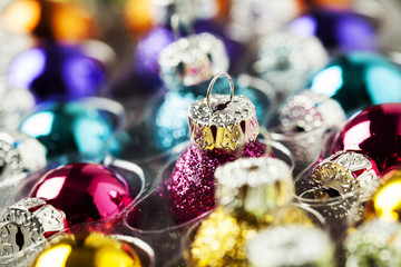 Bright multicolored christmas balls in rows