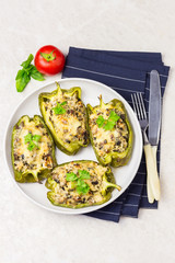 Cheesy stuffed poblano peppers with ground turkey. Top view copy space.