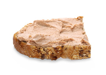 Whole wheat bread slices with liver pate isolated on white background