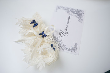 Garter on the leg of a bride, Wedding day moments