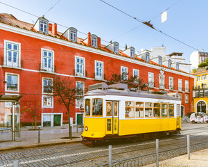 Fototapeta na wymiar Tram 28, the famous yellow tram in Lisbon