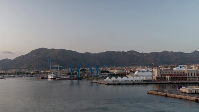 entering the palermo industrial port and shipping harbour shot from a ferry in the early morning, sicily, italy