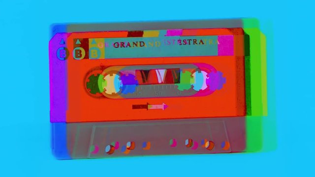 changing audio tape cassettes turn through 360 degrees