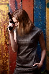 Obraz premium Woman with gun, night, outdoor.