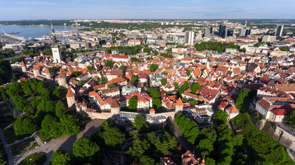 St. Olaf's Church is the tallest building in Old Town of Tallinn. Tourist sights in Estonia. Aerial...