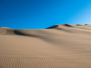 Fototapeta na wymiar Group of dunes near Huacachina oasis