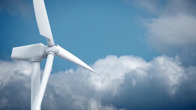 Beautiful white windmill on blue sky background