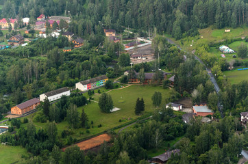 Fototapeta na wymiar Sanatorium in the mountains in summer, top view