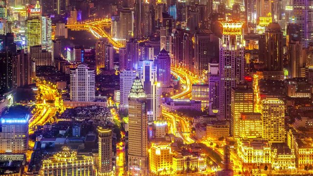 4K: Aerial night view of skyscraper and traffic in Shanghai China. Time lapse.