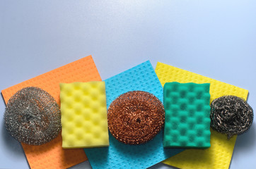 Sponges, metal sponges and cleaning napkins