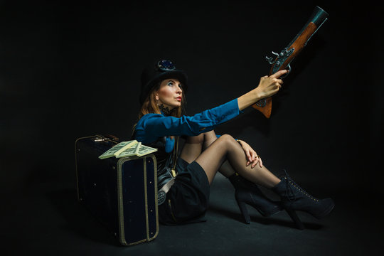 Steampunk girl armed and dangerous.