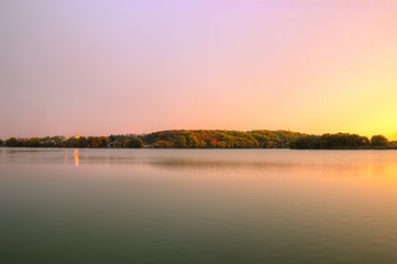 Evening in the river hill surrounded by forest and town