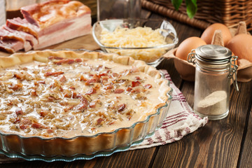 Making stuffing while preparing a traditional quiche