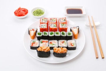 Set of sushi and rolls isolated on white background, pov view