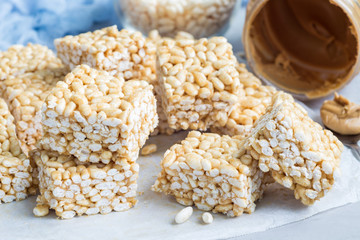Homemade bars with crispy rice, honey and peanut butter, horizontal