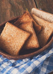 Breakfast background, toasts on checkered napkin closeup
