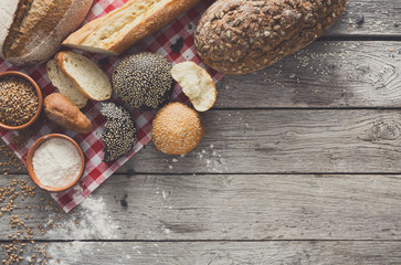 Bread background with copy space on rustic wood