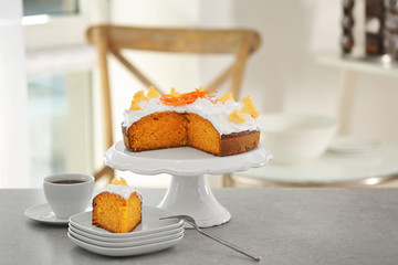 Delicious carrot cake on table