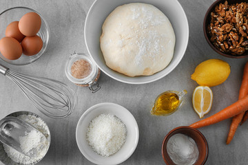 Ingredients for baking carrot cake on table