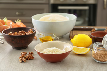 Ingredients for baking carrot cake on table