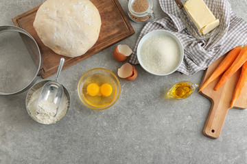 Ingredients for baking carrot cake on table