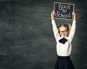 School Child Girl hold Blackboard, Back to School, Happy Kid in Classroom over Black Board...