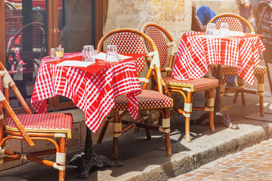 Tables of traditional outdoor French cafe in Paris