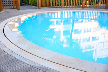 Obraz na płótnie Canvas Modern swimming pool in luxury hotel