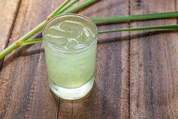 Iced lemon grass tea  on wooden background. herbal organic tea for  healthy and refreshment. 