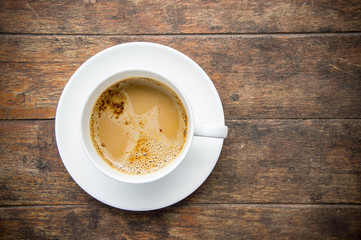 coffee time , instant coffee white cup on wood table , coffee break style on old wood and copy space