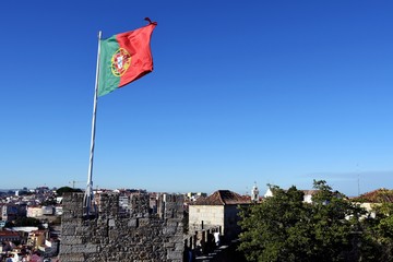 Fototapeta premium Flag of Portugal at the Castelo de Sao Jorge in Lisbon, Portugal