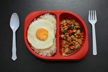 Instant food in red packed on table