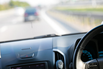 Fototapeta premium Look through a car wheel