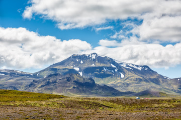 Islandic mountains under cloudy sky