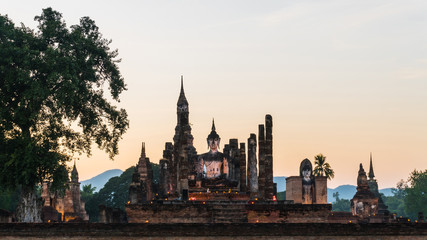 Fototapeta premium Buddha statue at wat mahathat temple in sukhothai historical park thailand