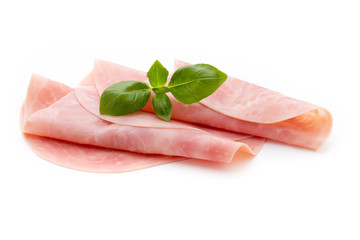 Thin slices of ham on white background.