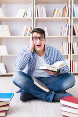 Young student studying with books