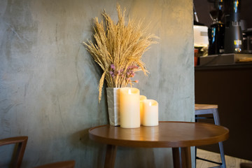 idea candle on wooden table