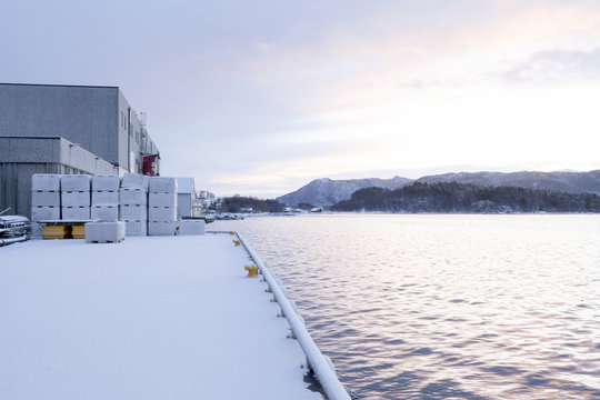 Sunrise at a fish processing plant in &Aring;lesund, Norway