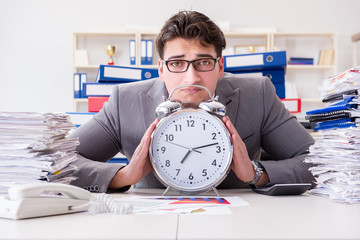 Businessman missing deadlines due to excessive work