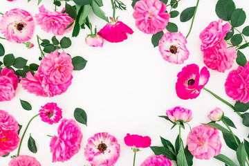 Floral wreath frame made of roses, pink flowers and leaves on white background. Flat lay, top view.