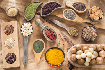 Group of super foods - seeds, spices, fruits, dust, grains, cereals