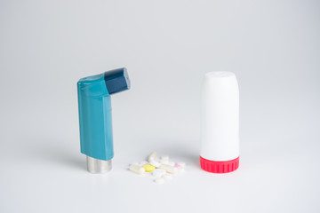 .Inhaler for relief of allergy and asthma attacks in the hand close up